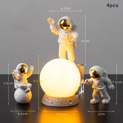 Astronautas e a lua para decoração