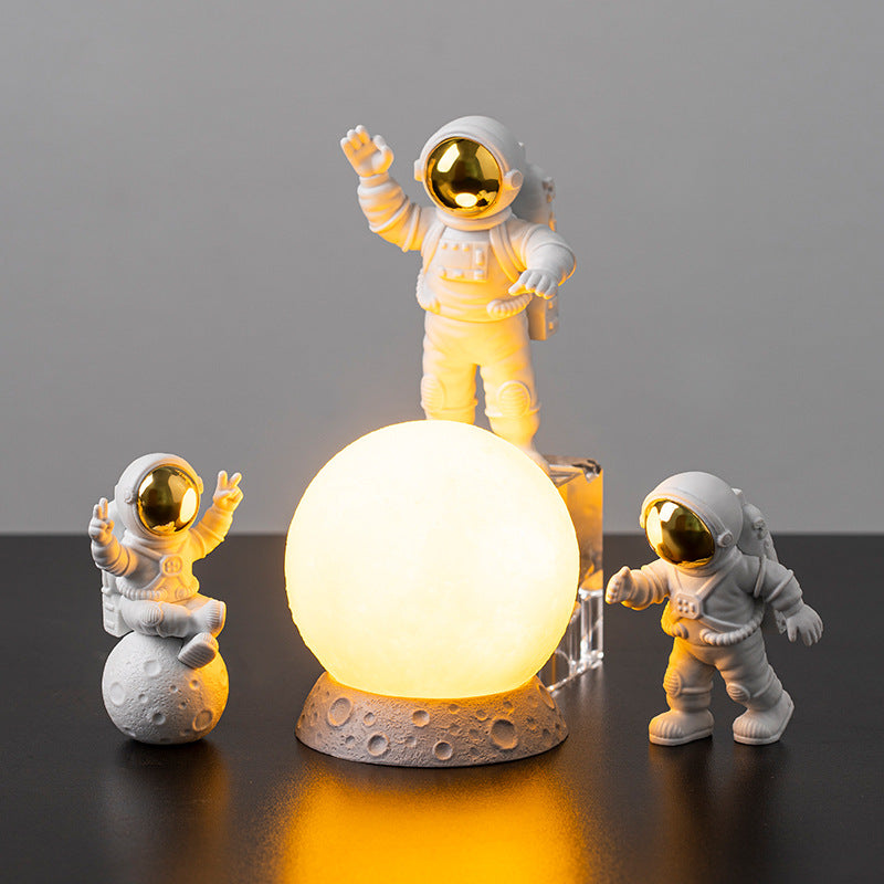 Astronautas e a lua para decoração