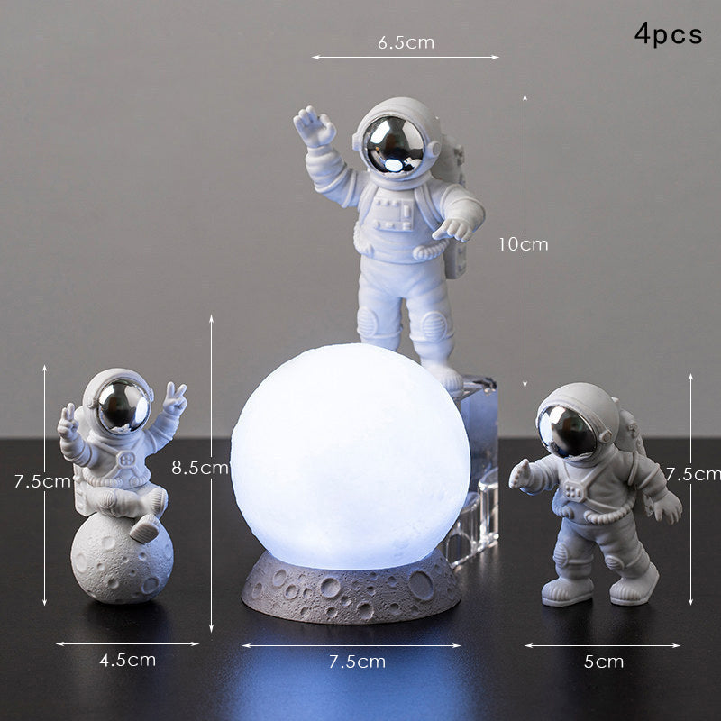 Astronautas e a lua para decoração